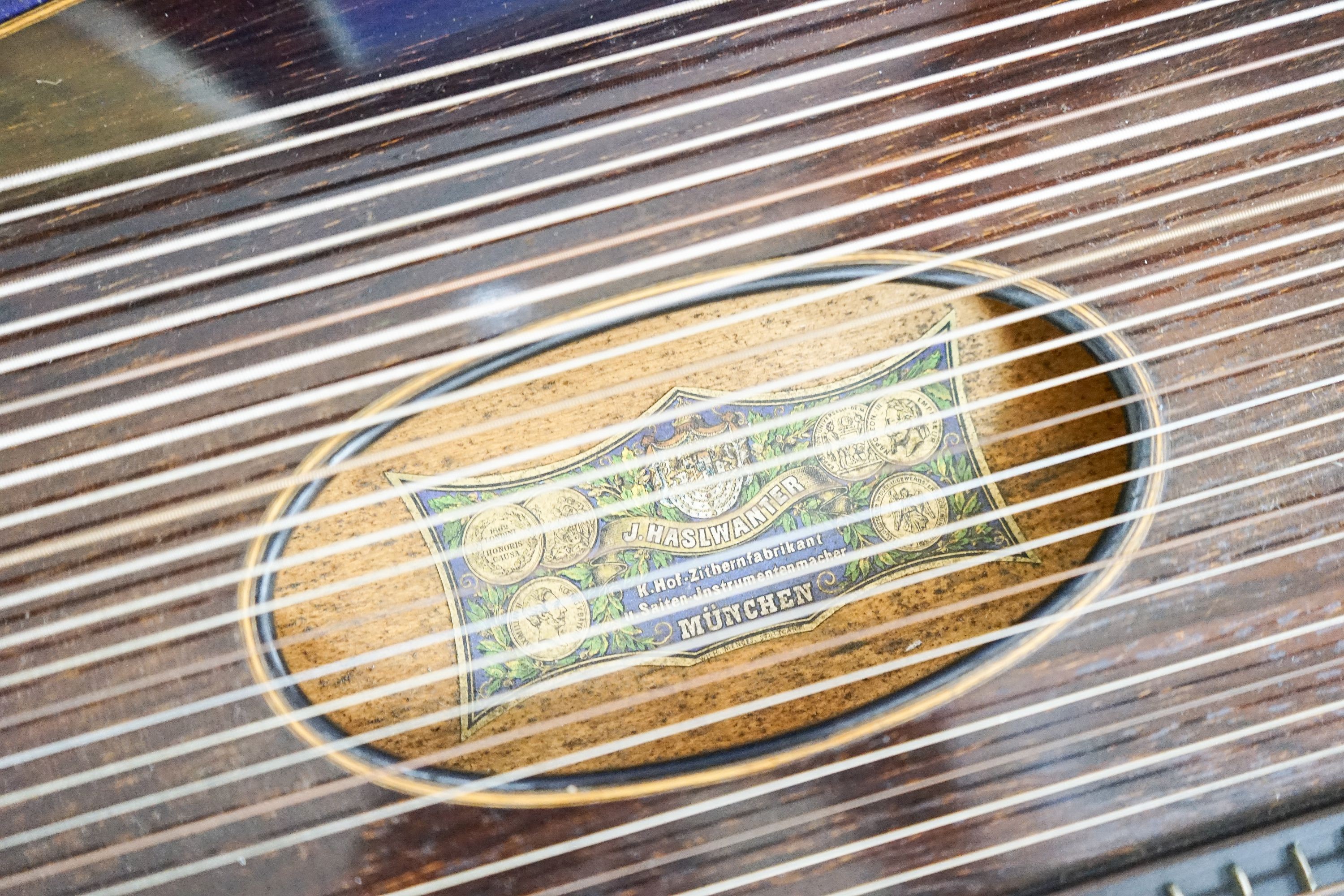 A cased J.Haslwanter guitar zither